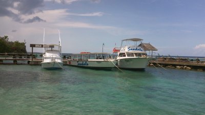 Sandals main scuba diving boat on right